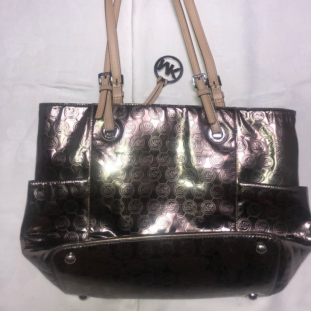 SOLD Used Michael Kors metallic dark silver tote